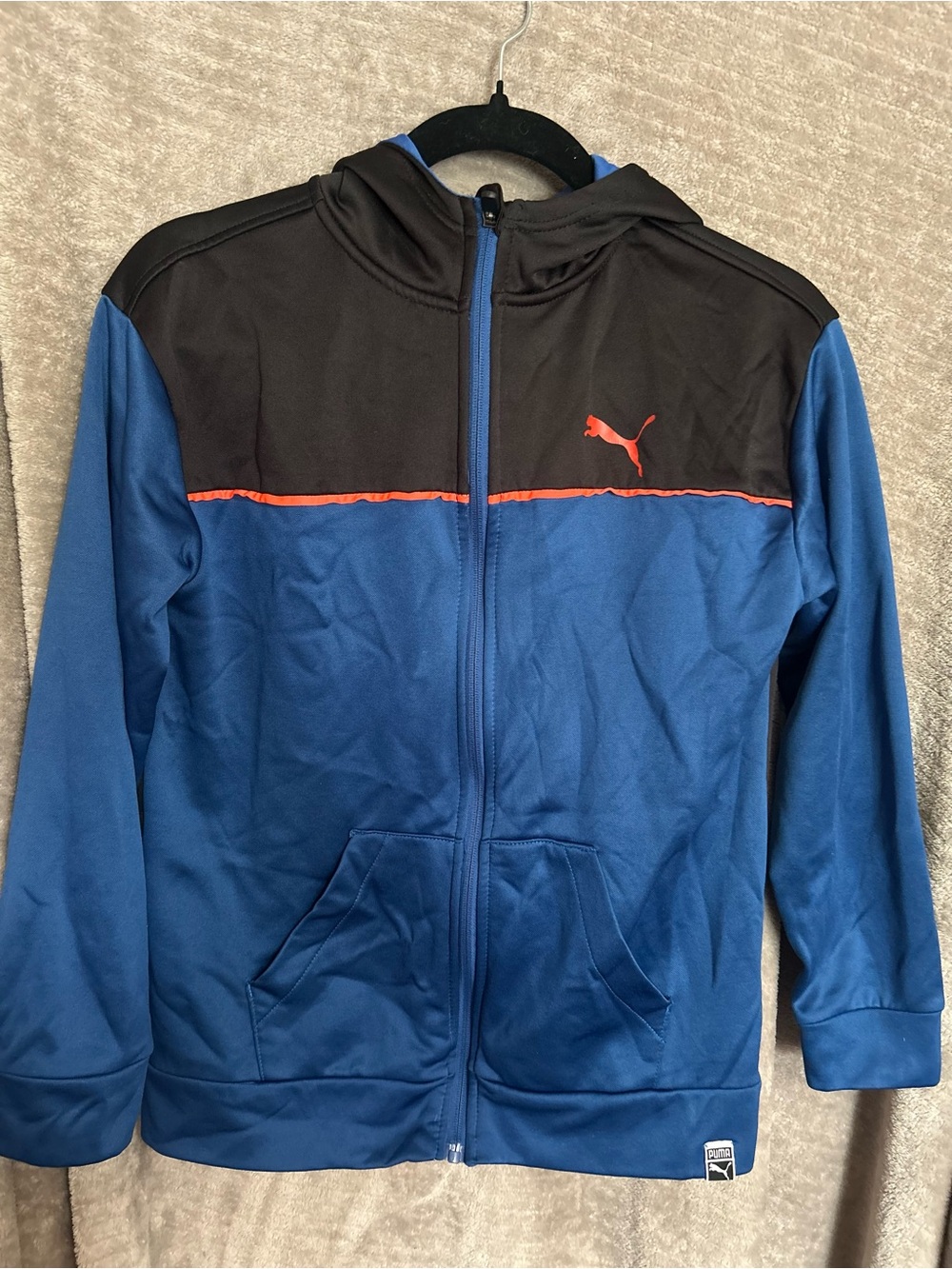 Puma Boys Blue Hooded Zip Jacket with Black Yoke and Orange Logo